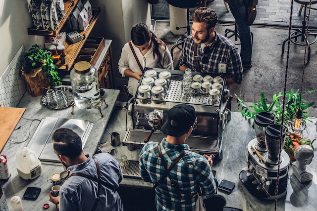 aerial view of a busy coffee shop in NYC fulfilling orders from their digital strategy 